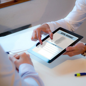 Patient reviewing dental insurance paperwork